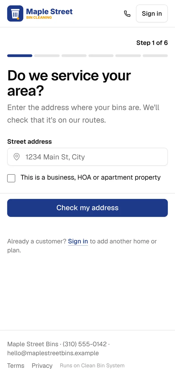 The styled address step on a phone with the logo and a navy Check my address button